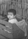 2myph149_A411_SGT_DURSO_PHOTO_OF_CIDG_TODDLER_IN_BEER_CRATE_AT_CIDG_CAMP_MY_67.jpg