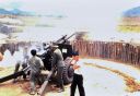 Viets_firing_M2A2_105_mm.JPG